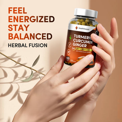 Hands holding HealthEssent Turmeric Curcumin Ginger supplement bottle - feel energized stay balanced with 3-in-1 herbal fusion for natural wellness